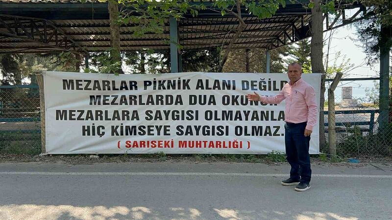 “Mezarlar piknik alanı değildir” diyen muhtar, mezarlıklarda pikniği yasakladı